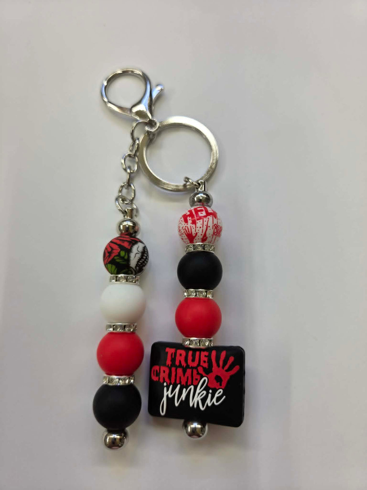 One More Episode True Crime Junkie Beaded Keychain