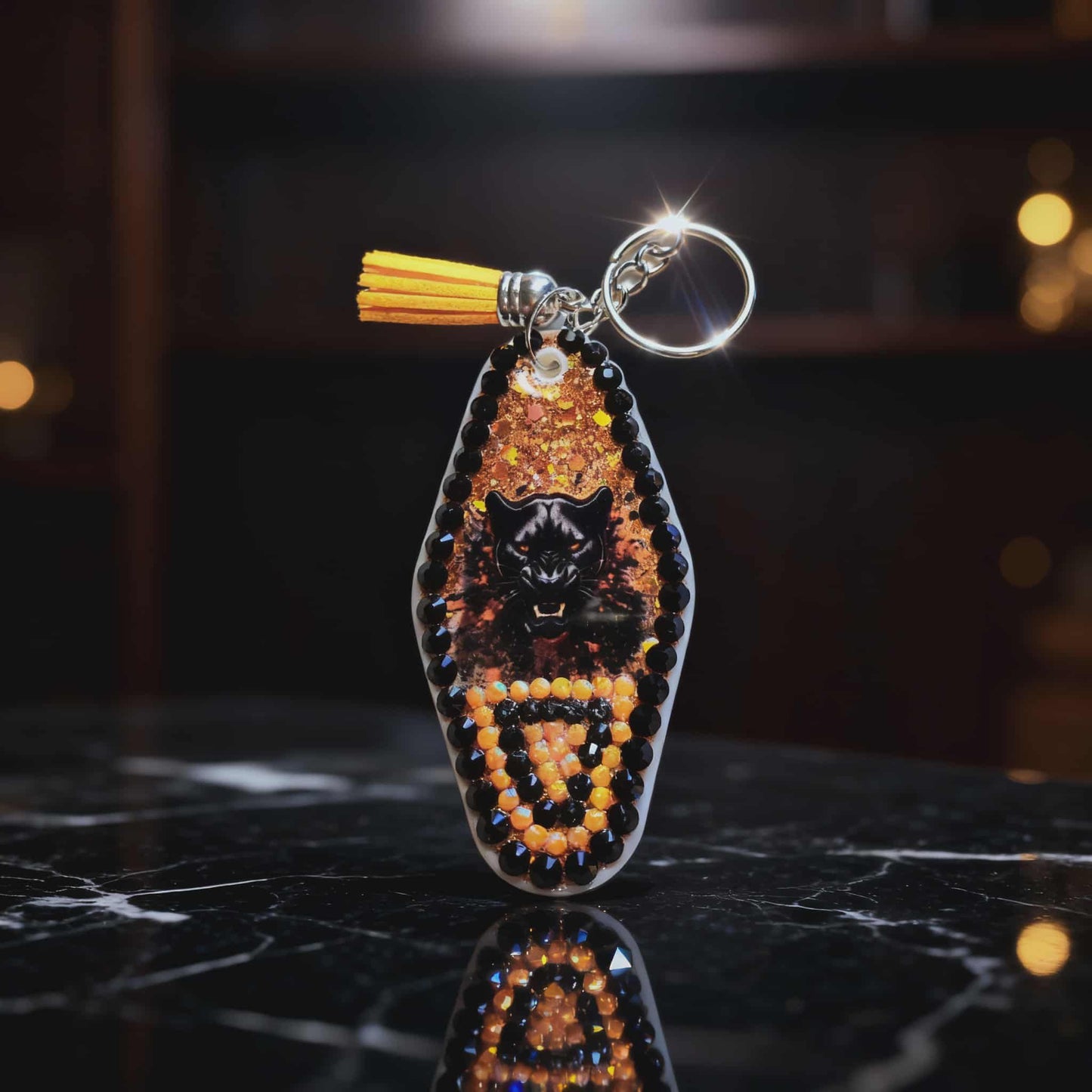 🐾 Powell Panther Pride Resin Keychain – Handmade Black & Orange Glitter Mascot Charm with Tassel Accent 🐾