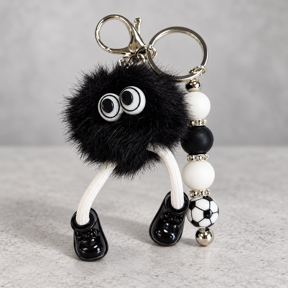 Black Fuzzy Monster Soccer Beaded Keychain
