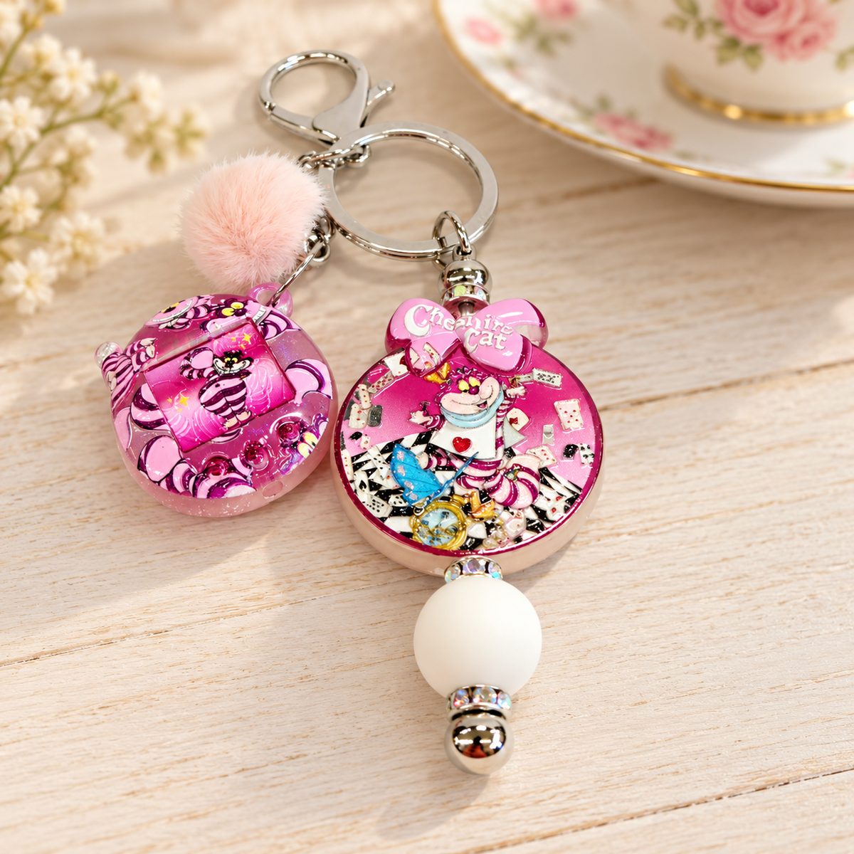 Cheshire Cat Pink Beaded Keychain with Pom Pom