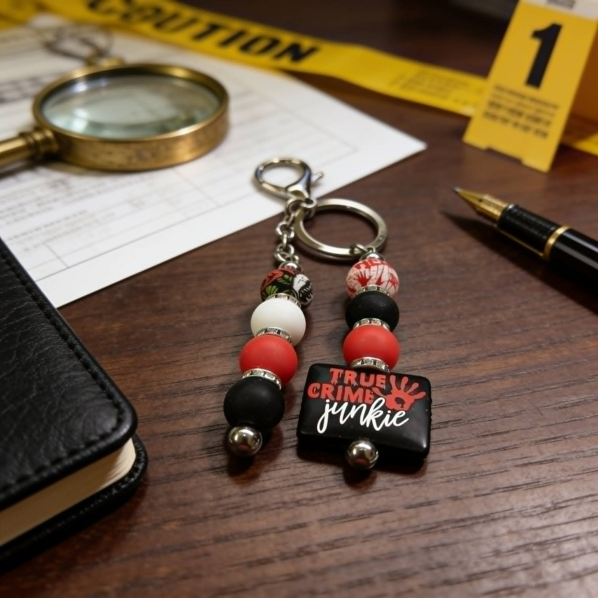One More Episode True Crime Junkie Beaded Keychain