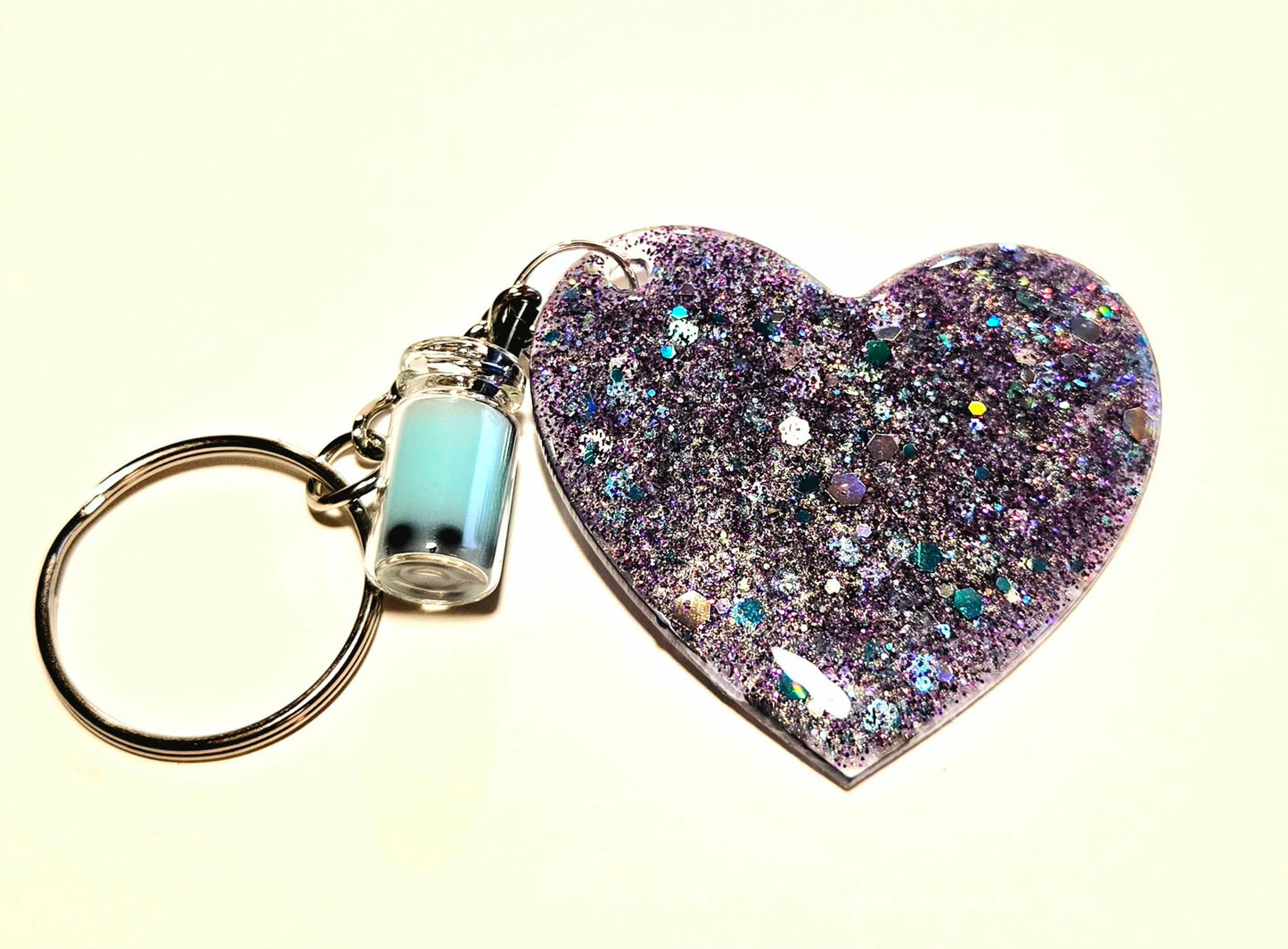Cute Highland Cow Heart Resin Keychain – Purple Glitter Charm with Mini Boba Bottle