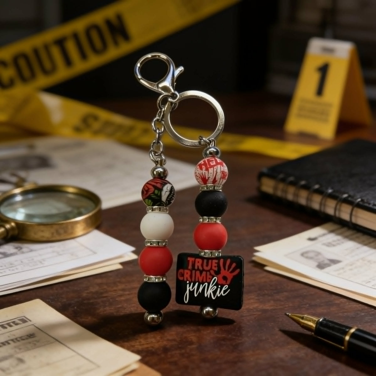 One More Episode True Crime Junkie Beaded Keychain