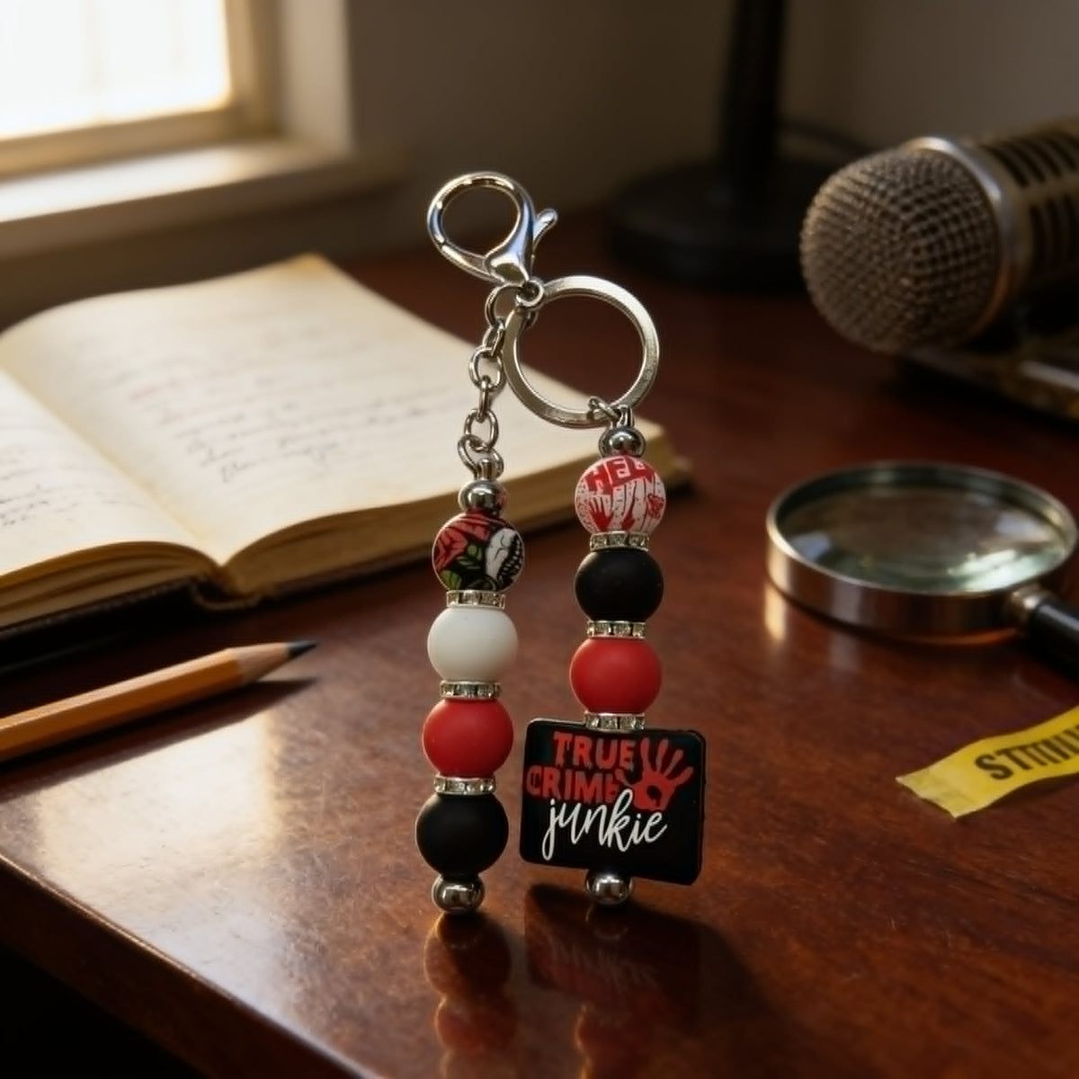 One More Episode True Crime Junkie Beaded Keychain